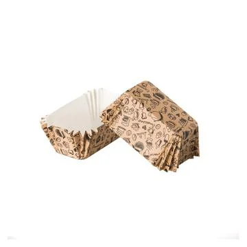 Brown paper baking forms for cakes with home utensils pattern Stock Photos