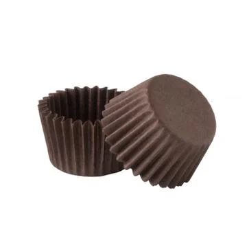 Brown paper baking forms for muffins Stock Photos