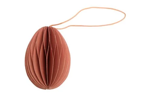 Brown paper easter egg decoration with honeycomb structure. Minimalist hang.. Fotos de archivo