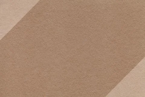 Brown paper texture background with beige diagonal edges and copy space for.. Stock Photos