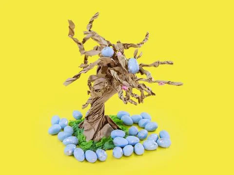 Brown paper tree with Easter eggs on its branches Stock Photos