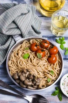 Brown pasta with vegetables Stock Photos