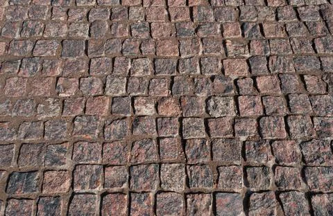 Brown paving stone surface Stock Photos