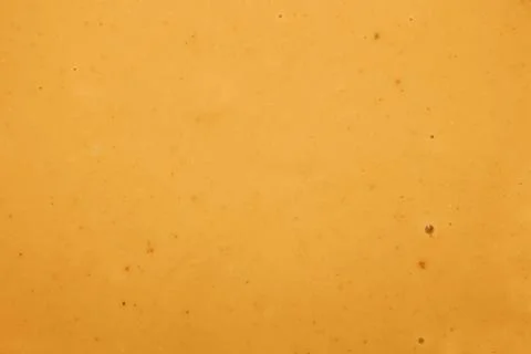 Brown peanut paste made from whole nuts.The texture of peanut paste top view. Stock Photos