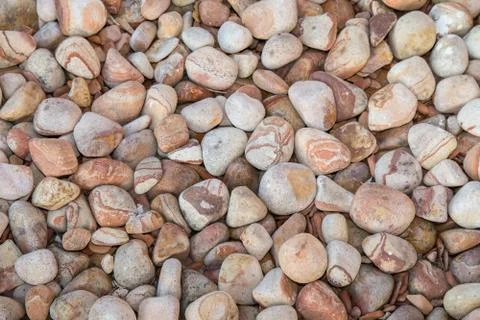 Brown pebbles background Stock Photos
