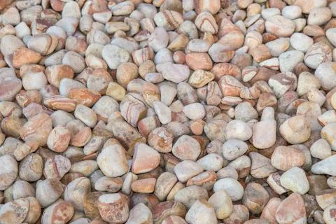 Brown pebbles background Stock Photos