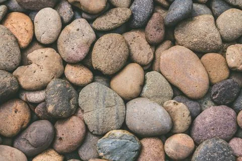 Brown pebbles stone background Stock Photos
