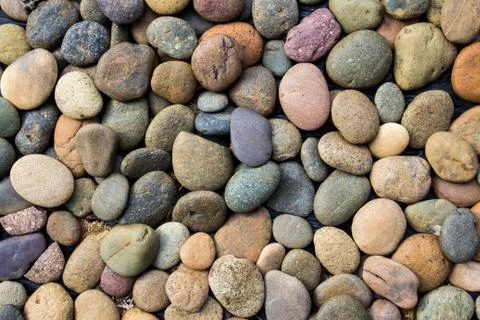 Brown pebbles stone background Stock Photos