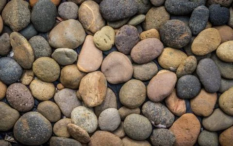 Brown pebbles stone background Stock Photos