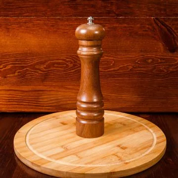 Brown pepper mill Stock Photos