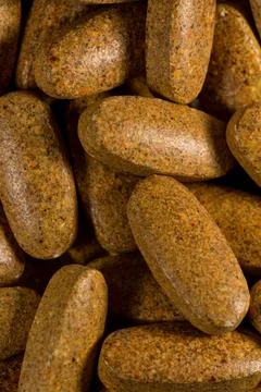 Brown Pills Spread Out Stock Photos