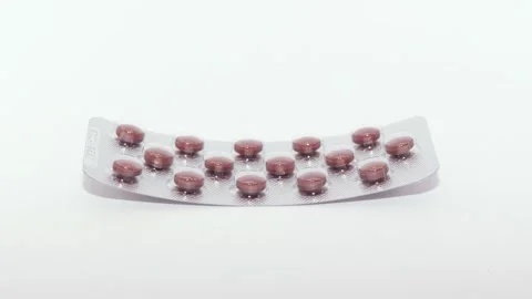 Brown pills video Stock Footage 302372649
