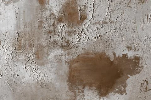 Brown plaster texture with rough decorative surface, visible brush strokes .. Stock Photos