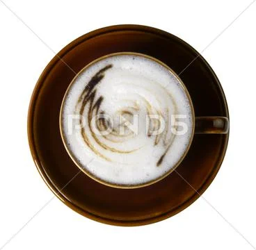 Brown porcelain cup with marbled milk froth Stock Photos