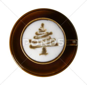 Brown porcelain cup with marbled milk froth Stock Photos