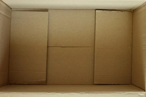 Brown post box packaging put on wood floor Foto stock