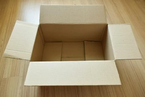 Brown post box packaging put on wood floor Foto stock