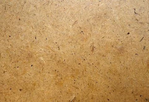 Brown pressed cardboard background Stock Photos