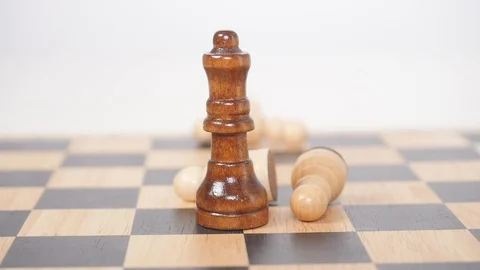 Brown queen figure take down pawns Stock Footage 106386709