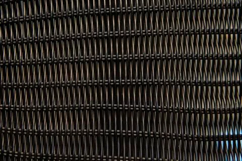 Brown rattan pattern texture on a chair. Stock Photos