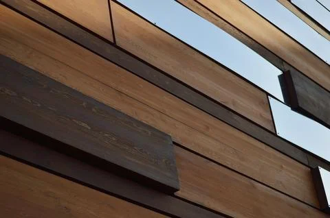 Brown rectangular decorative wooden planks, mirror panels in an abstract pa.. Stock Photos