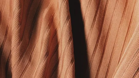 Brown ribbed fabric fold background featuring textured textile material and eleg Stock Footage 336302081