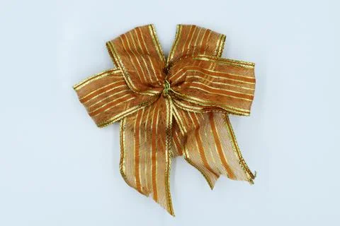 Brown ribbon bow isolated on white background. Stock Photos