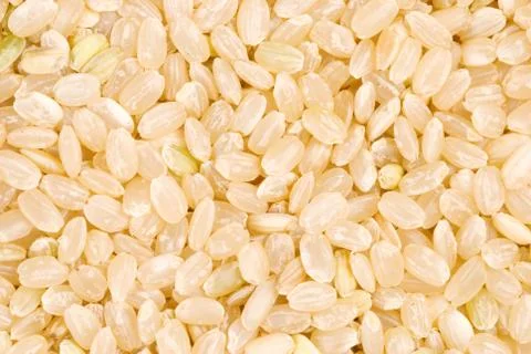 Brown rice as background Fotos de archivo