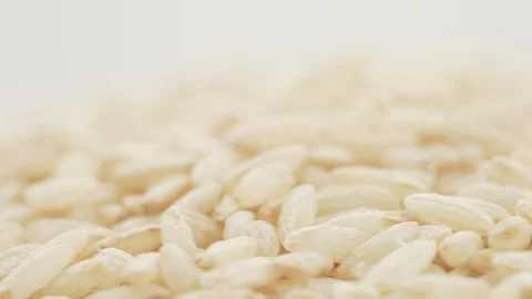 Brown rice in bulk Stock Footage 86683772