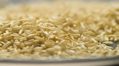 Brown rice - close-up, slow-motion Видео 138504919