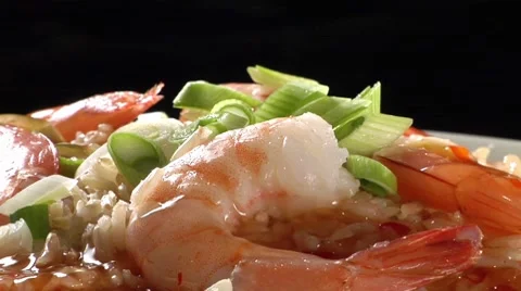 Brown rice with prawns and spring onions Stock Footage 8574052
