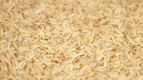 Brown rice slowly rotating, macro closeup Stock Footage 132641289