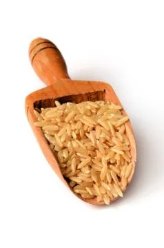 Brown rice uncooked Stock Photos