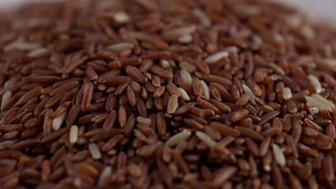 Brown Rice On the White Dish Video stock 236747416