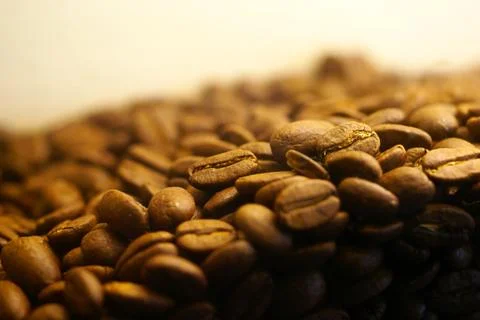 Brown roasted coffee beans background Stock Photos