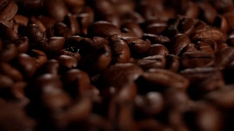 Brown roasted coffee beans. Camera rotation. Stock Footage 300445979