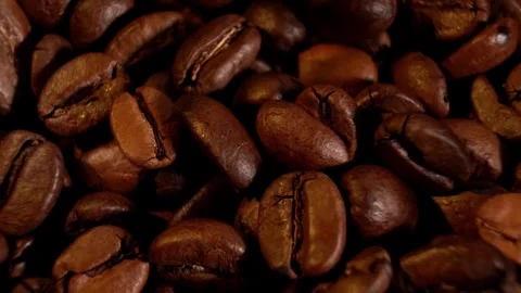 Brown roasted coffee beans. Camera rotation. Stock Footage 300445989