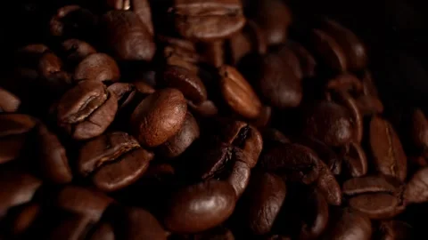 Brown roasted coffee beans. Camera rotation. Stock Footage 300446003