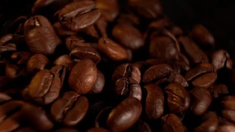 Brown roasted coffee beans. Camera rotation. Stock Footage 300446016
