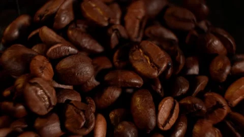 Brown roasted coffee beans. Camera rotation. Stock Footage 300446024