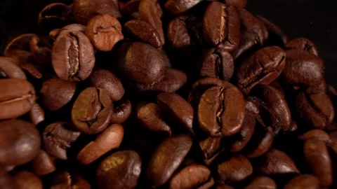 Brown roasted coffee beans. Camera rotation. Stock Footage 300446031