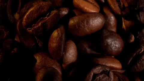 Brown roasted coffee beans. Camera rotation. Stock Footage 300446037