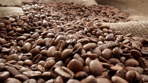 Brown roasted coffee beans. Pile of aromatic coffee beans. Rich harvest Stock Footage 303281146