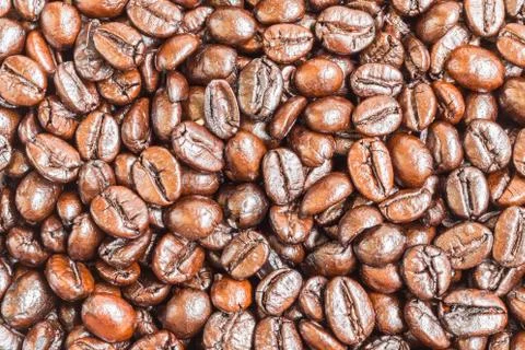 Brown roasted coffee beans , texture background Stock Photos