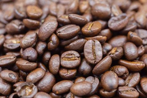 Brown roasted coffee beans texture background for food and drink Foto stock