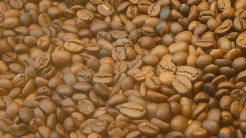 Brown roated coffee beans background, closeup Video stock 142962292