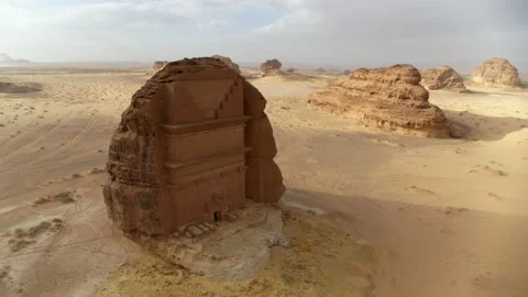 Brown Rock Structure In Desert Against Cloudy Sky - AlUla, Saudi Arabia Stock Footage 163812109