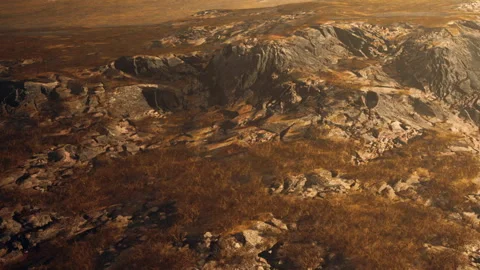 Brown rocky surface and dry grass under sunlight in a vast landscape Stock Footage 340024025