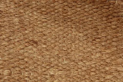Brown rough camel wool fabric texture pattern as background. Stock Photos