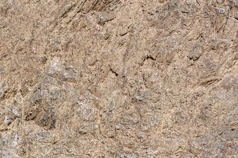 Brown, rustic, stone surface divided by splitting Stock Photos